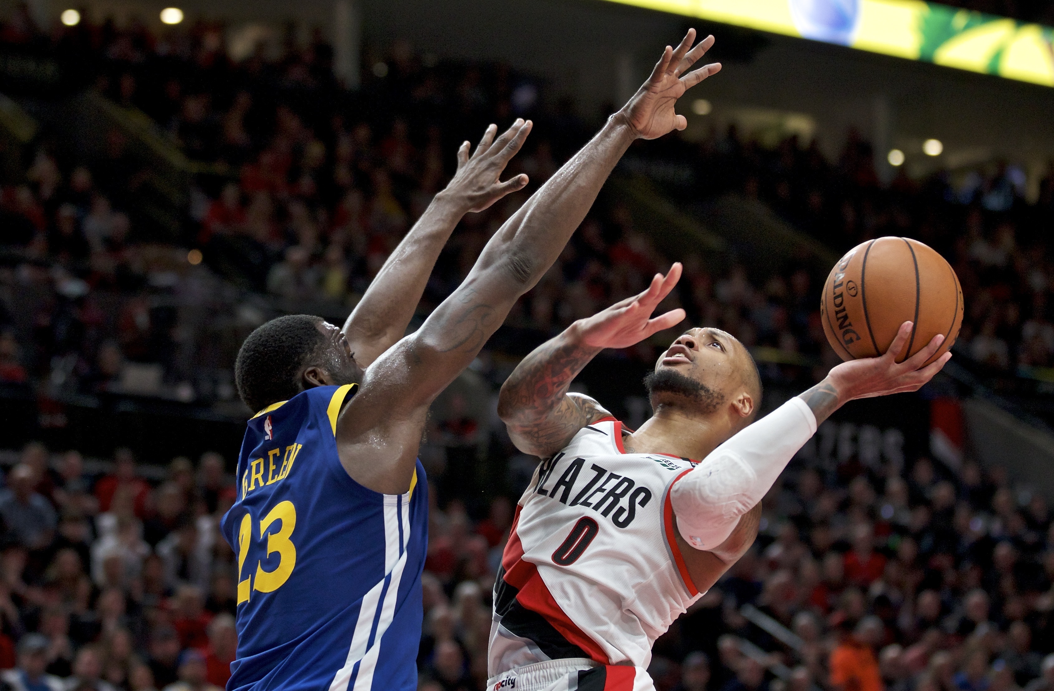 Lillard says he has separated ribs, will play through pain