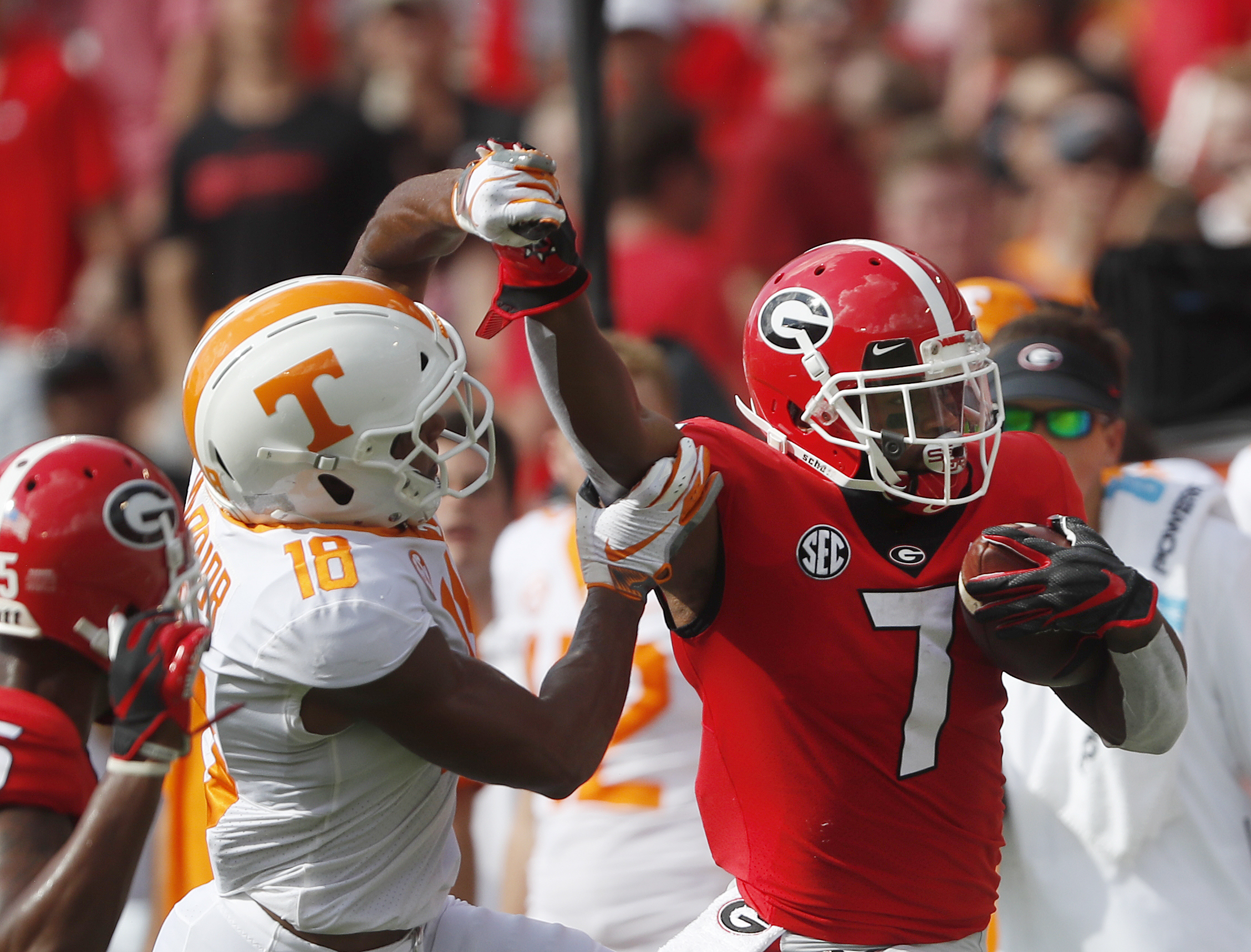 Swift runs for 2 TDs as No. 2 Georgia tops Tennessee, 38-12