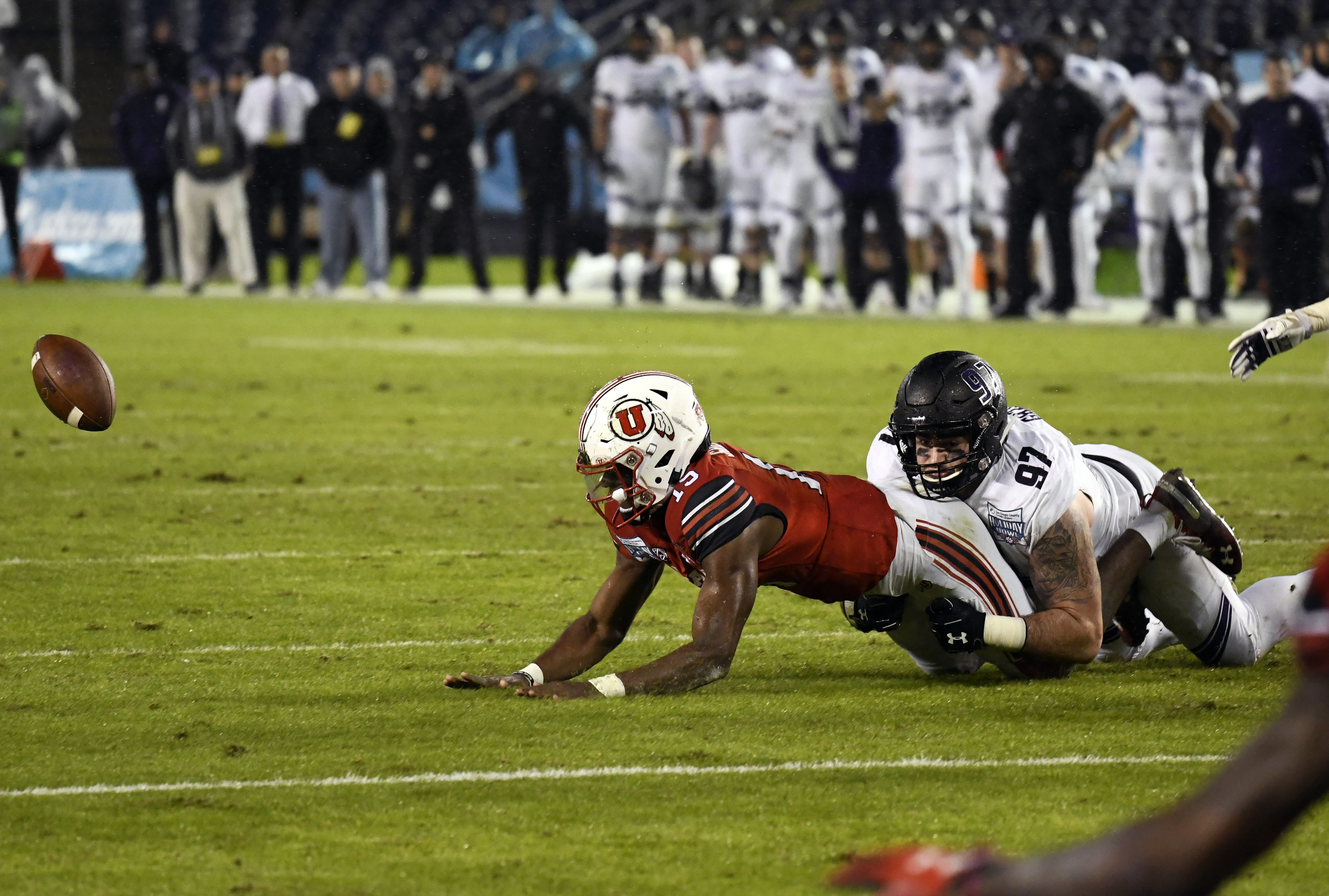 Northwestern defense stuns No. 20 Utah 31-20 in Holiday Bowl