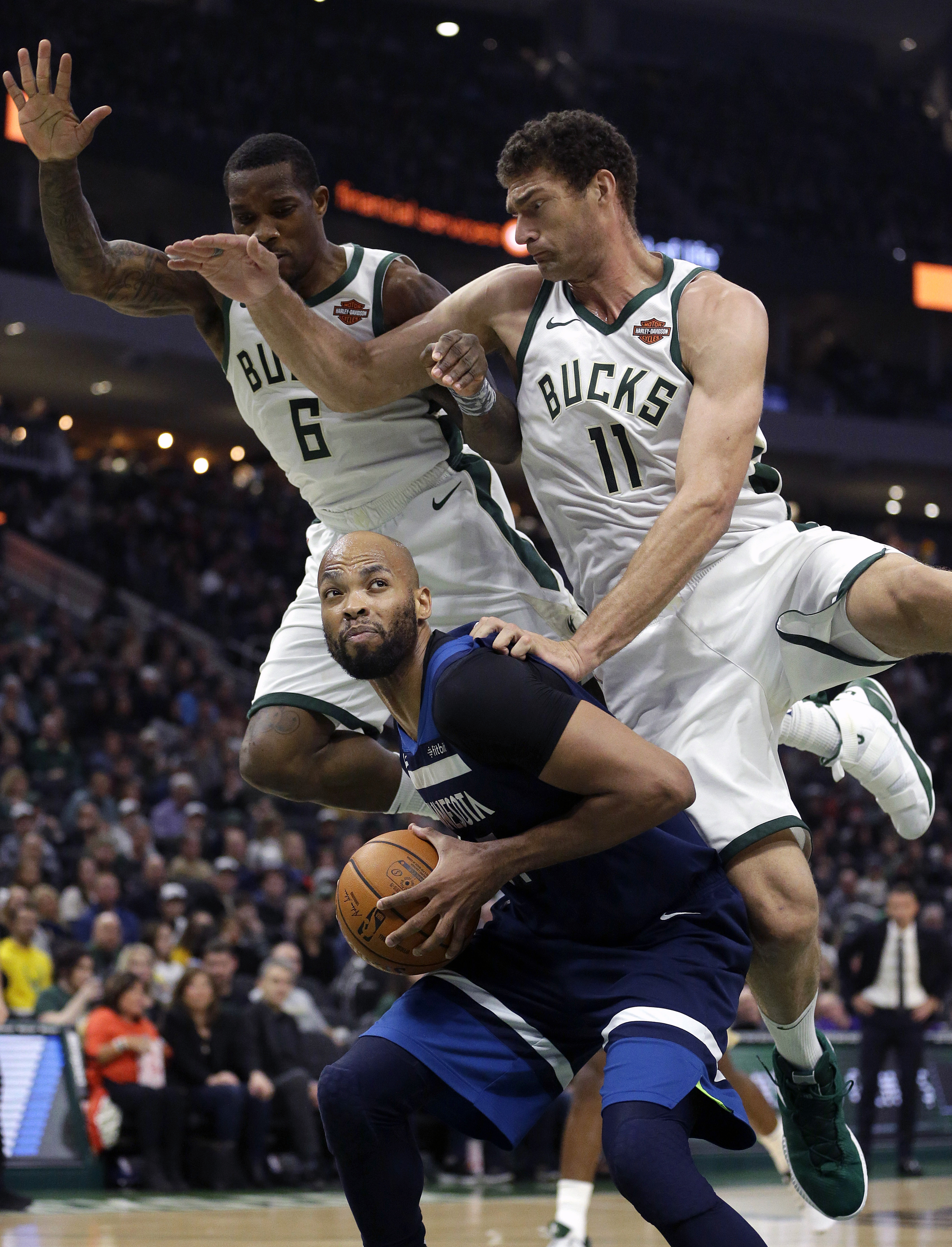 Middleton, Antetokounmpo lead Bucks past T-Wolves 140-128