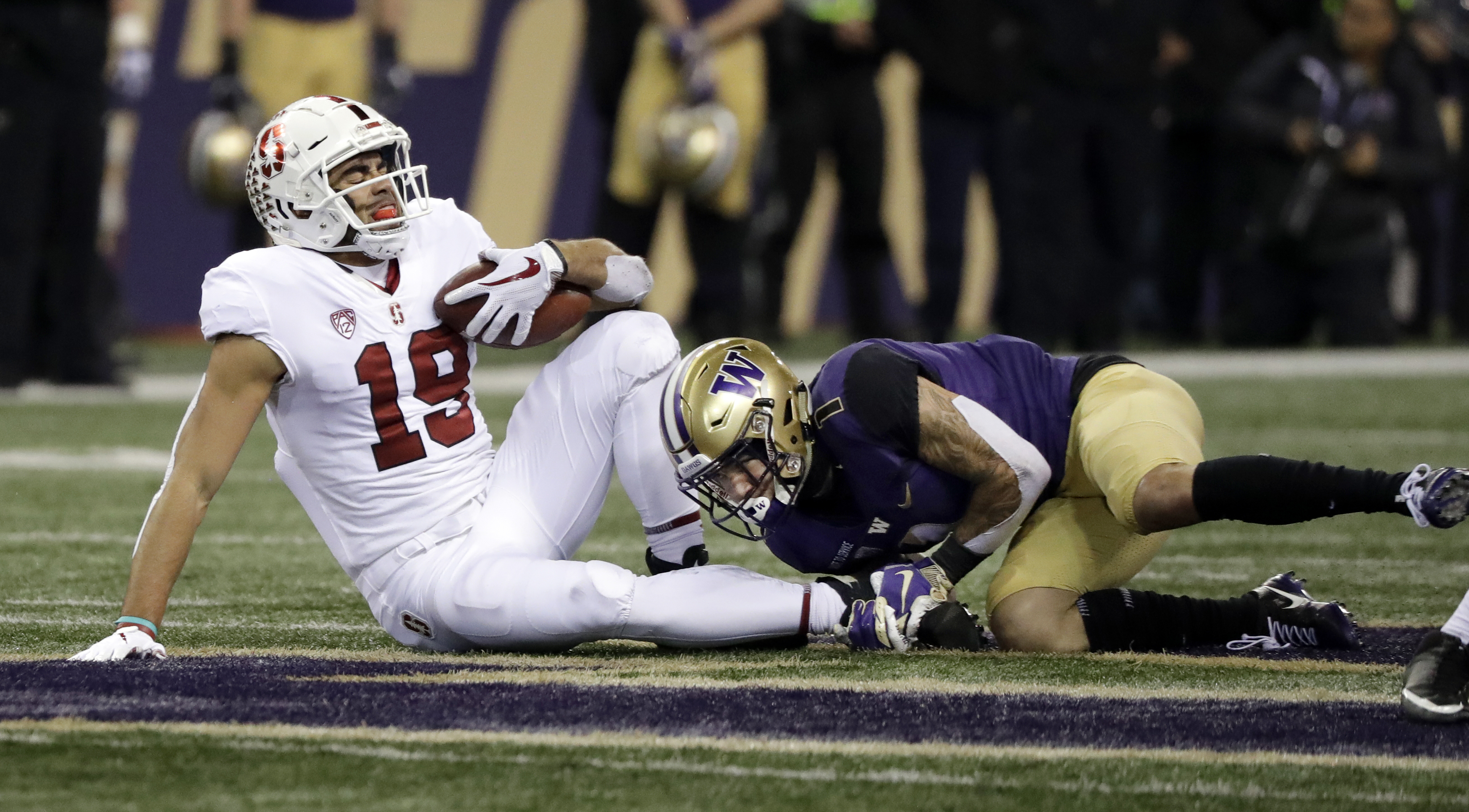Washington holds off Stanford’s late rally, wins 27-23