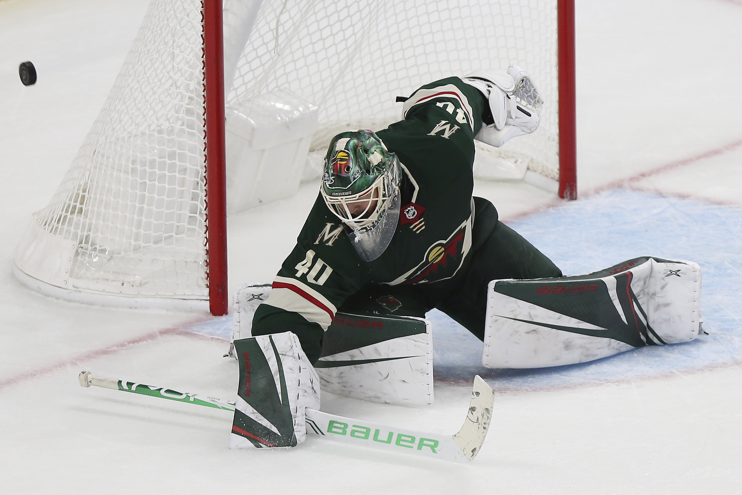 Wild G  Dubnyk leaves game after collision