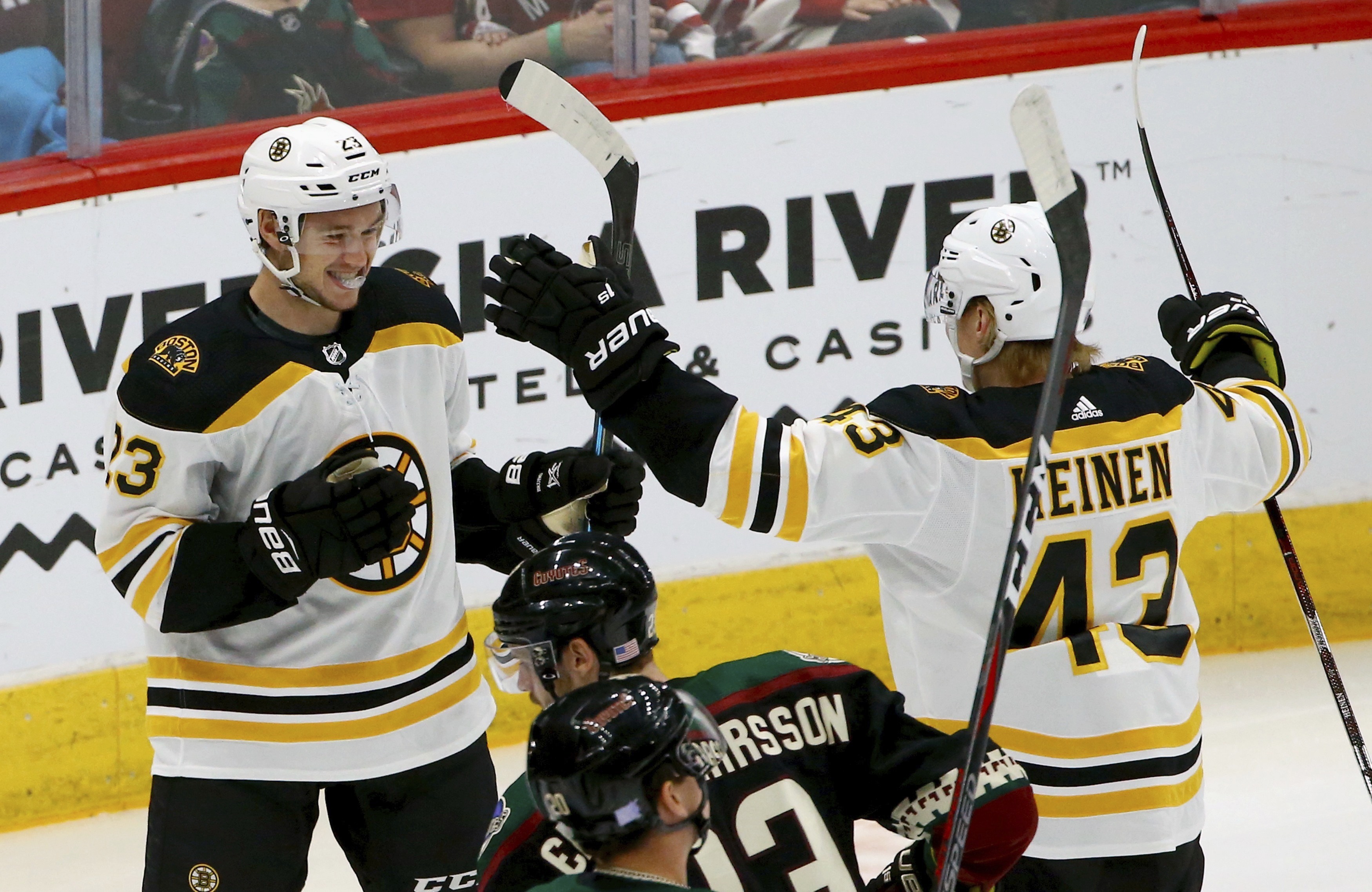 Karlsson, DeBrusk give Bruins 2-1 win over Coyotes