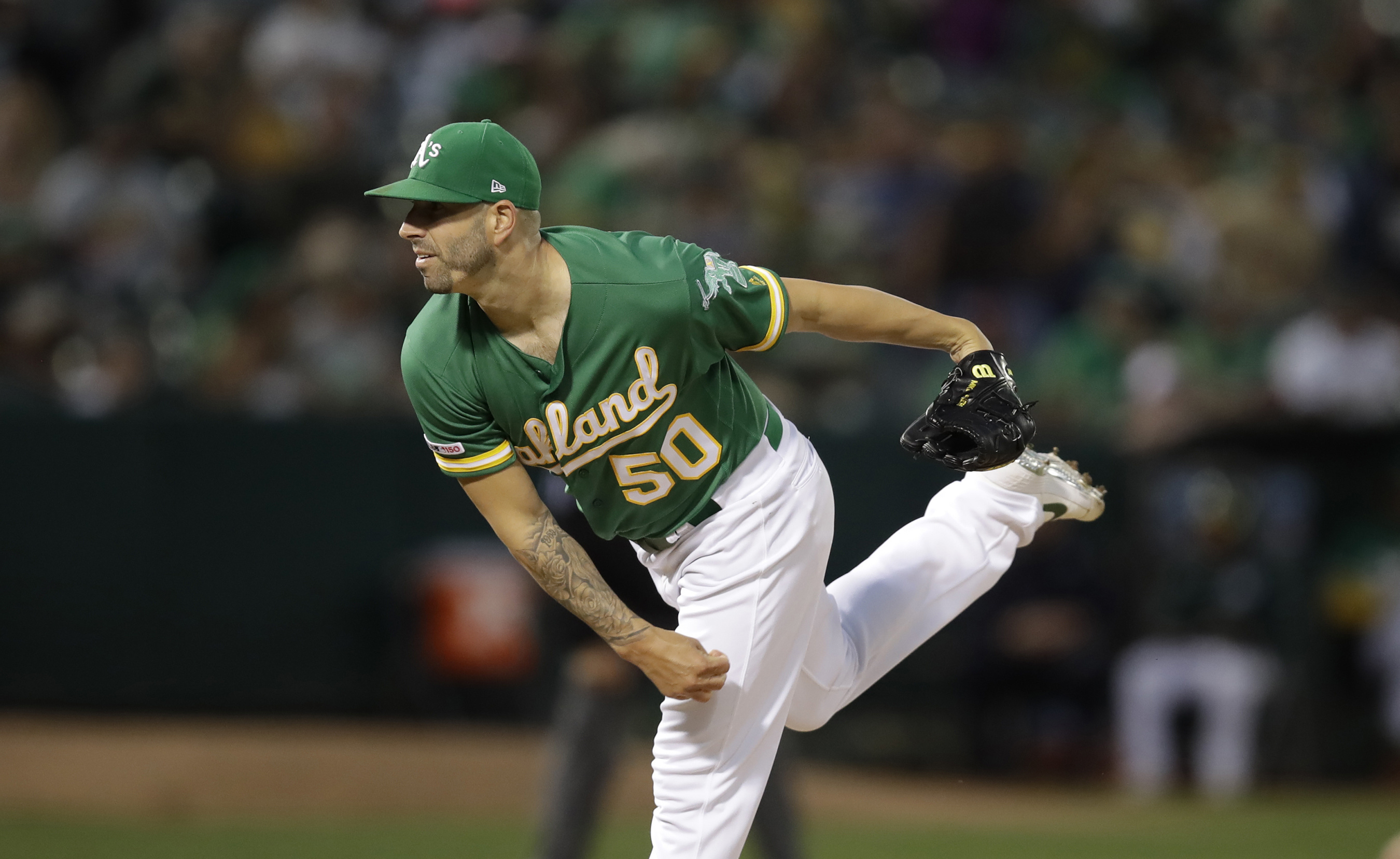 Fiers, A's rout Rangers 8-0, maintain 2-game wild card lead