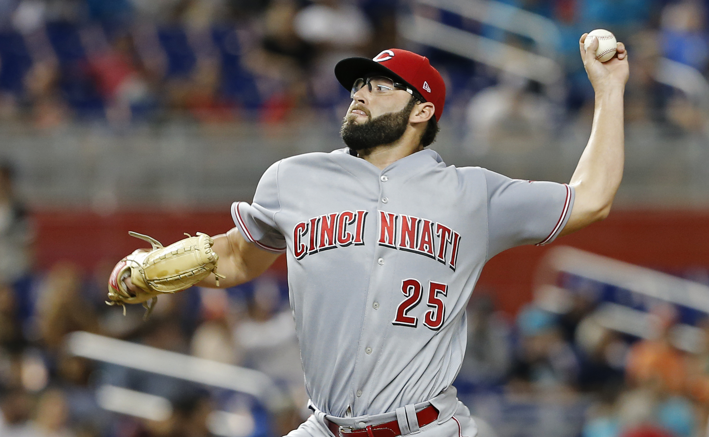 Reed wins in 1st major league start, Reds top Marlins 4-2