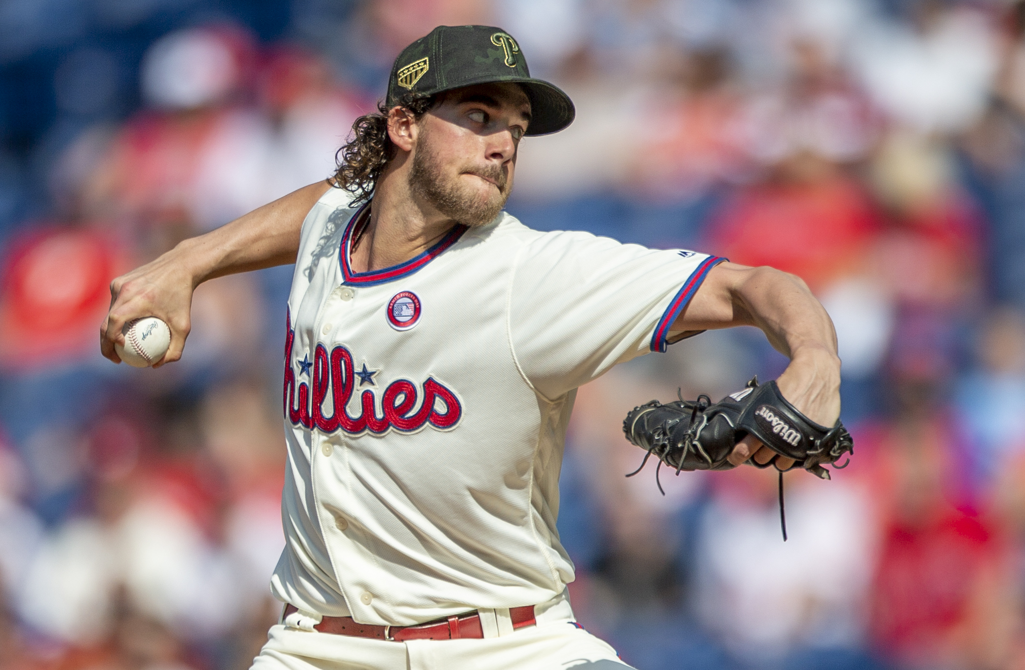 Harper’s bat, Nola’s arm lead Phillies past Rockies 2-1