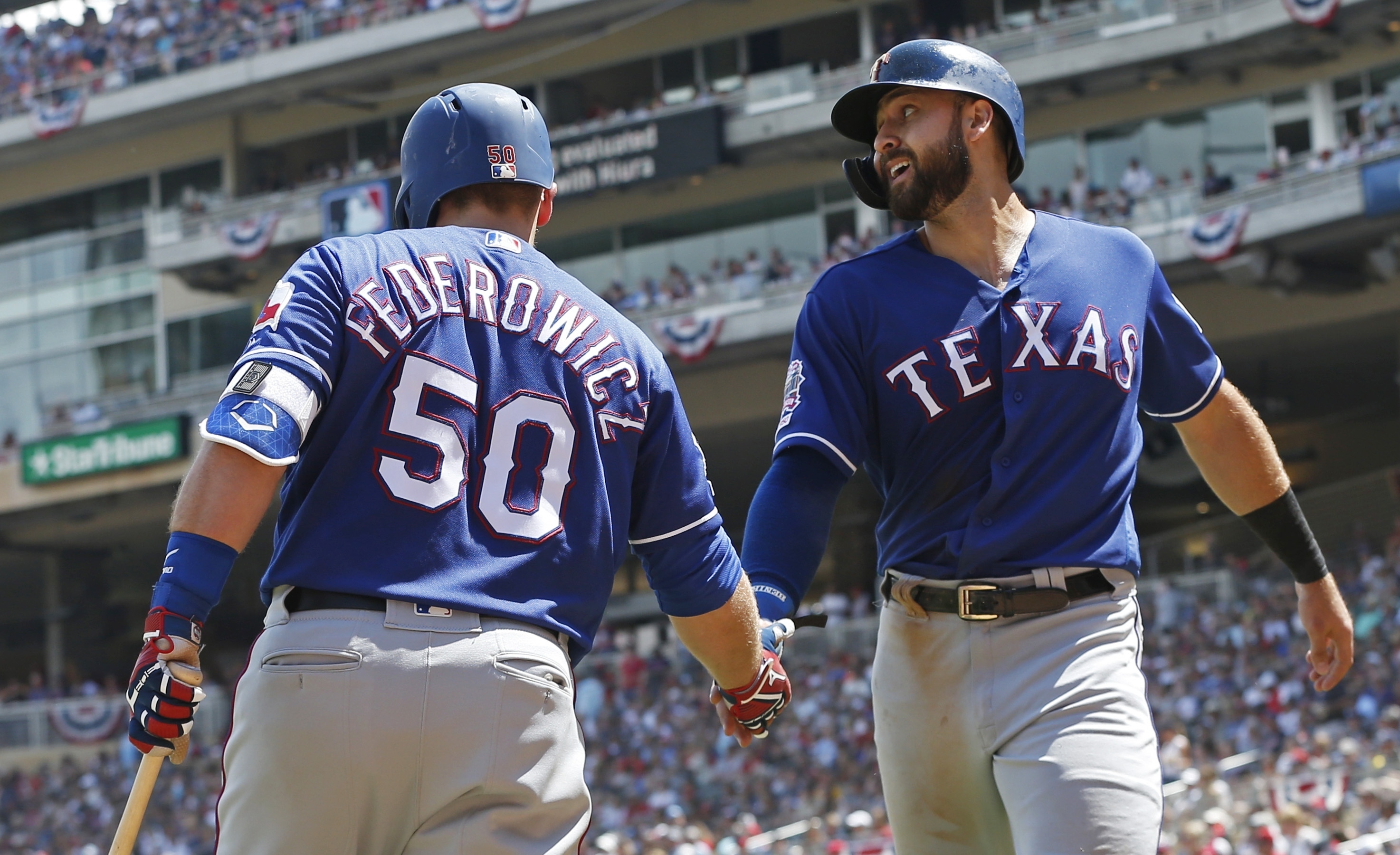 Odor's homer sends Rangers past Twins 4-1 in 11 innings