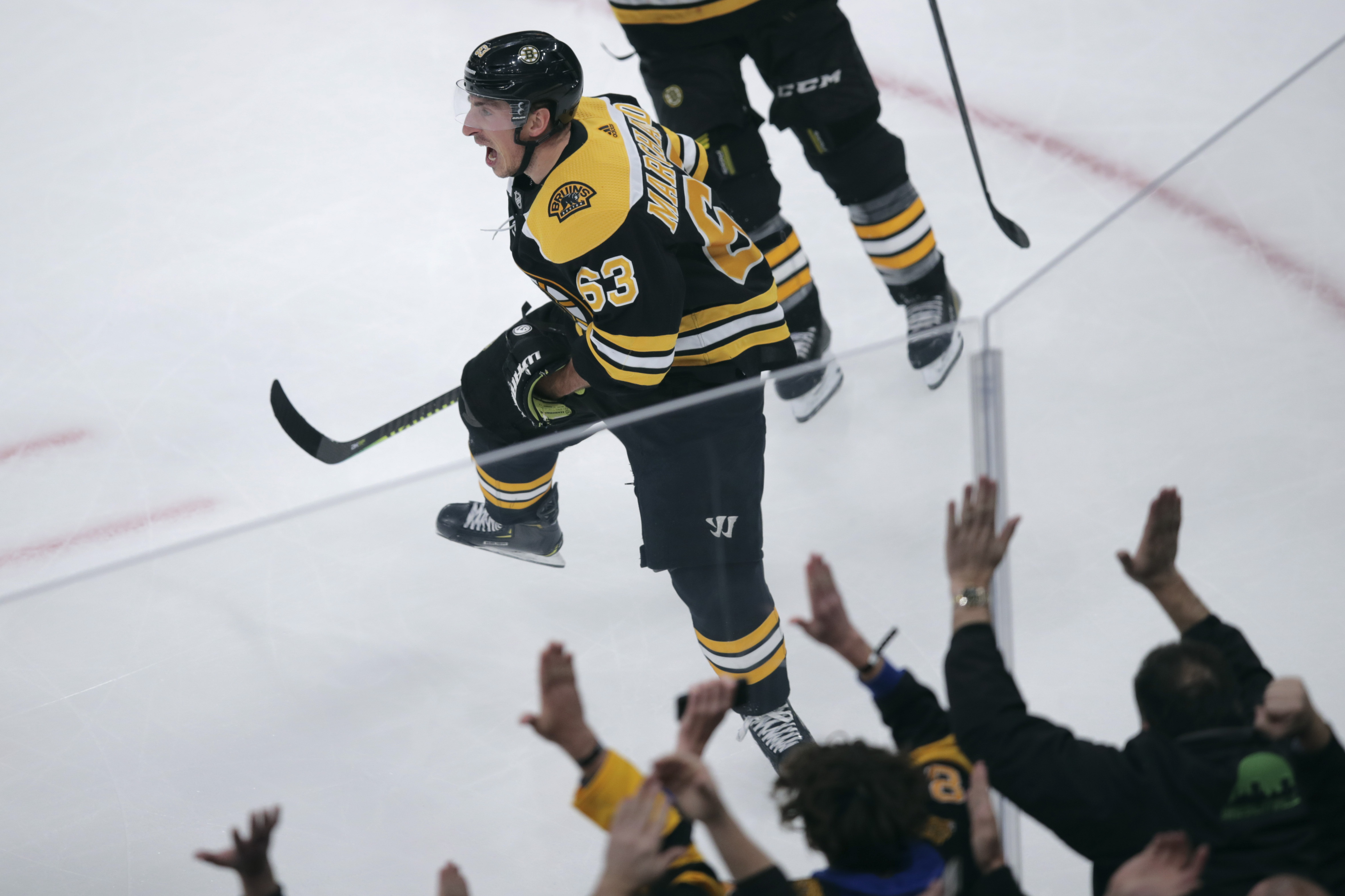 Marchand's 2 goals, 3 assists carry Bruins to 6-4 win