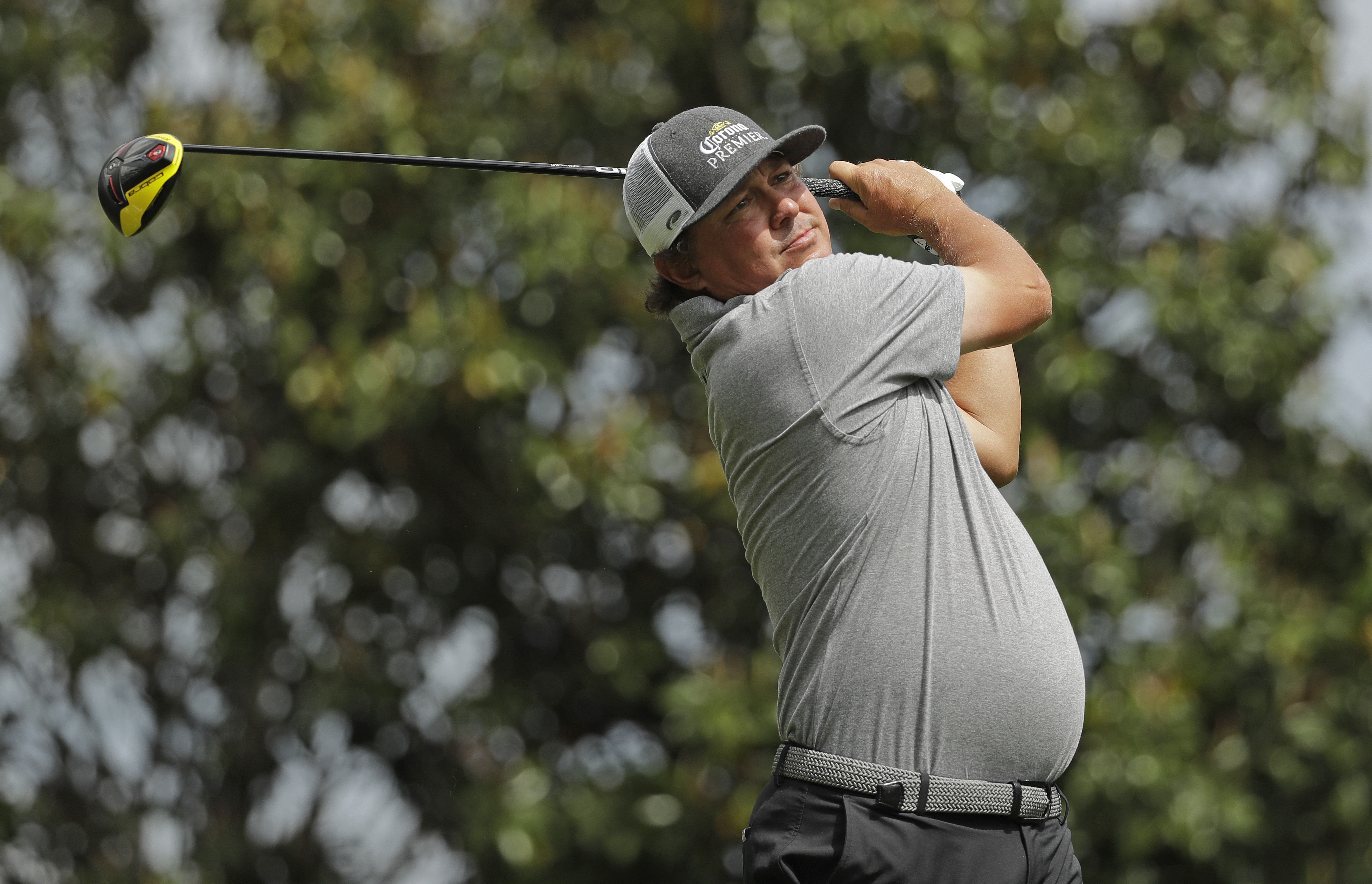 Dufner takes Wells Fargo lead with a 63