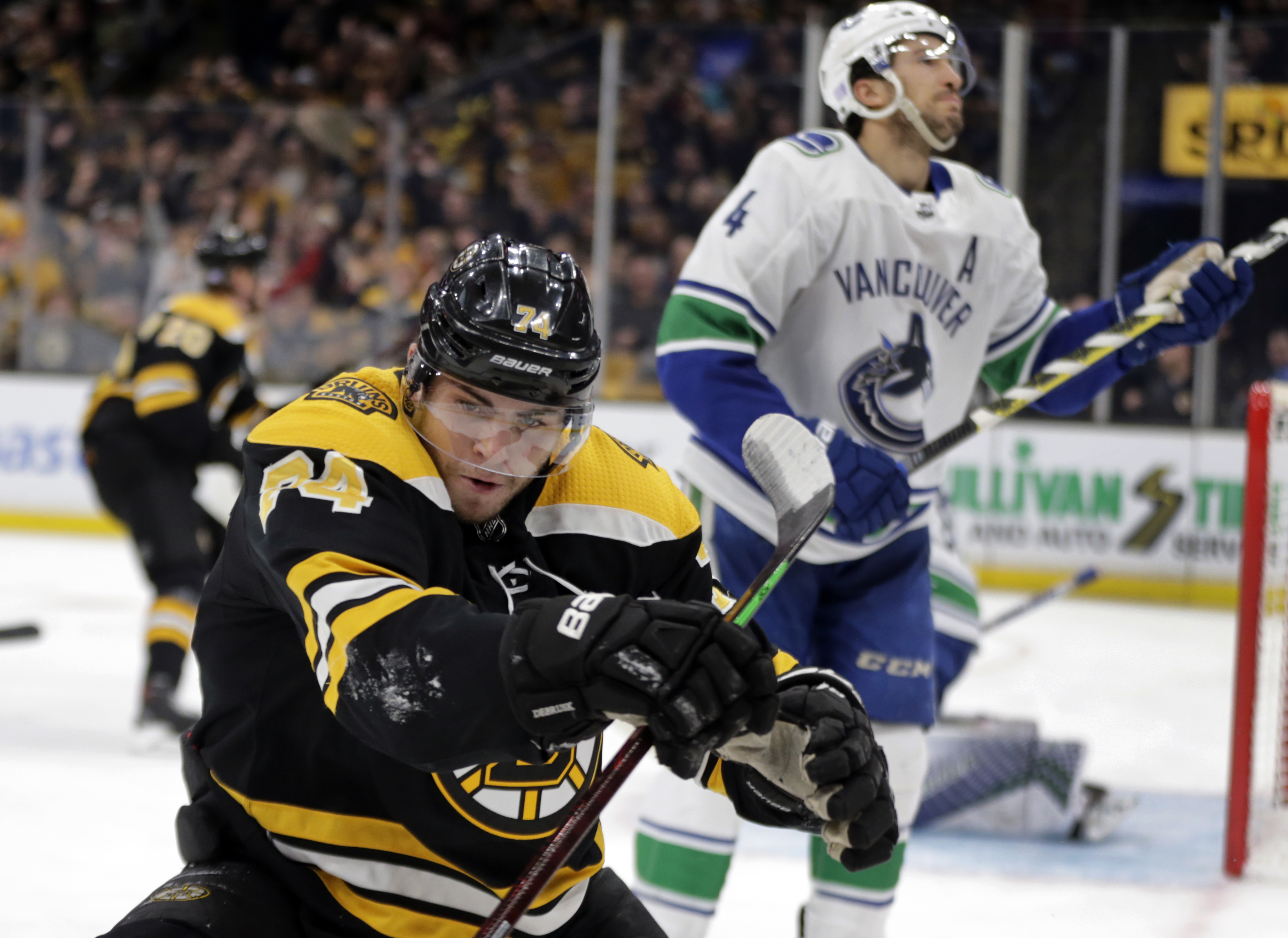 Horvat, Eriksson each score twice, Canucks top Bruins 8-5