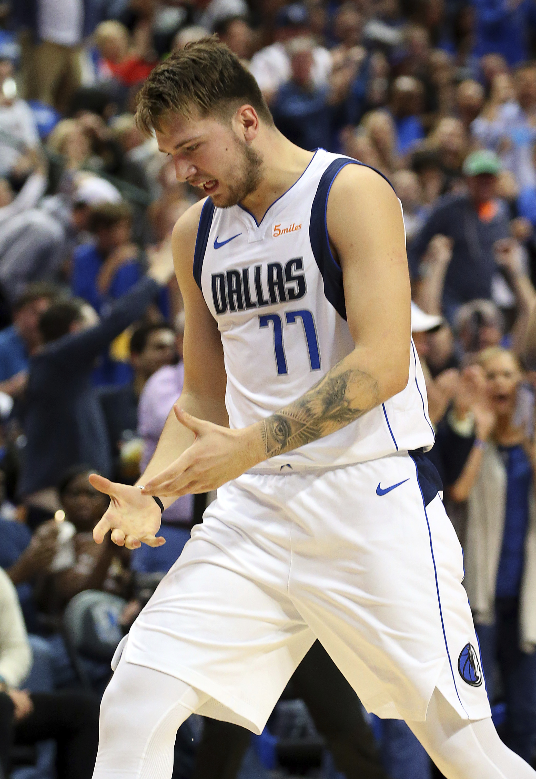 Youngsters Doncic, Smith lead Mavs past Wolves 140-136
