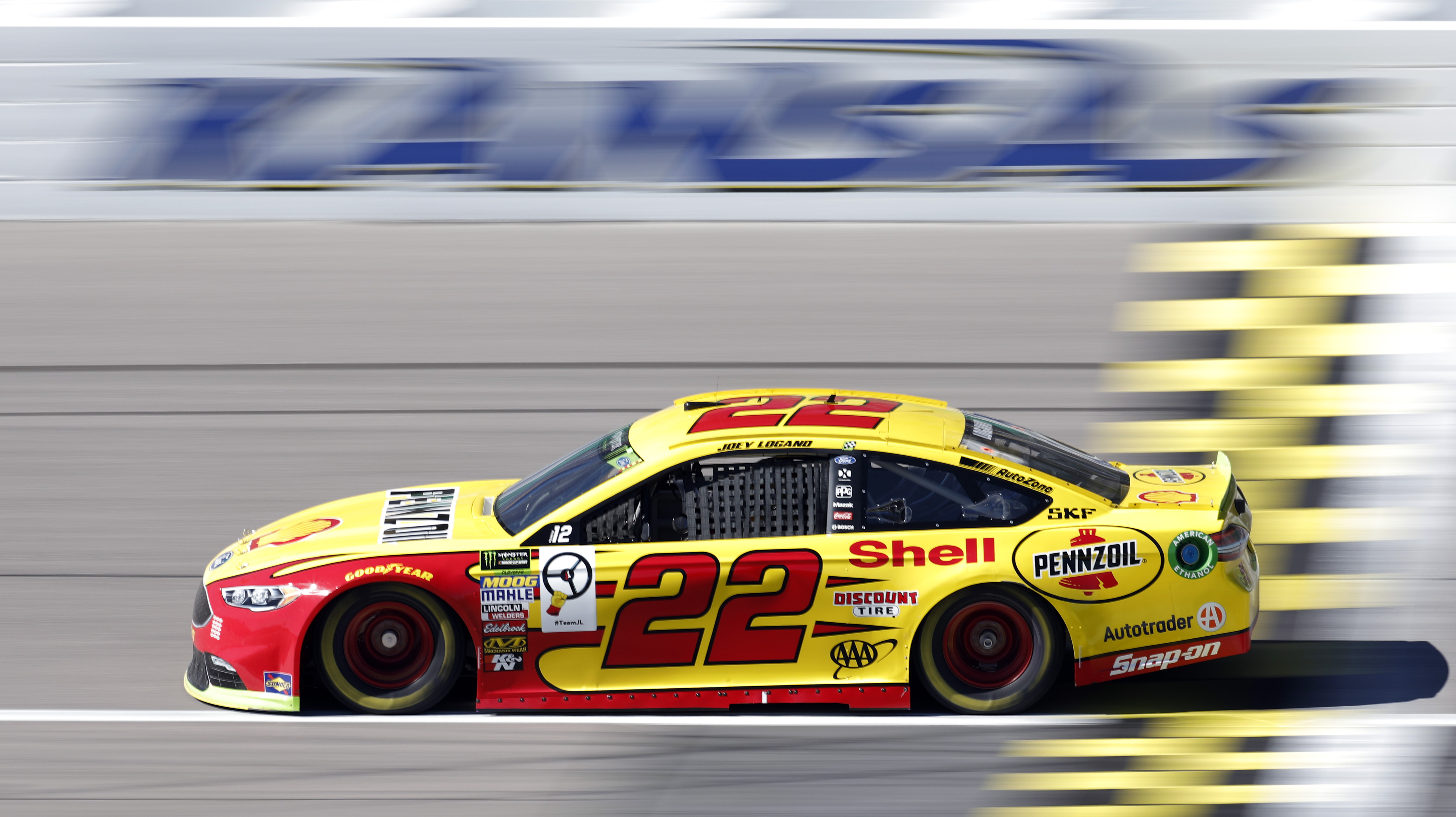 The Latest: Logano wins 1st stage at Kansas Speedway