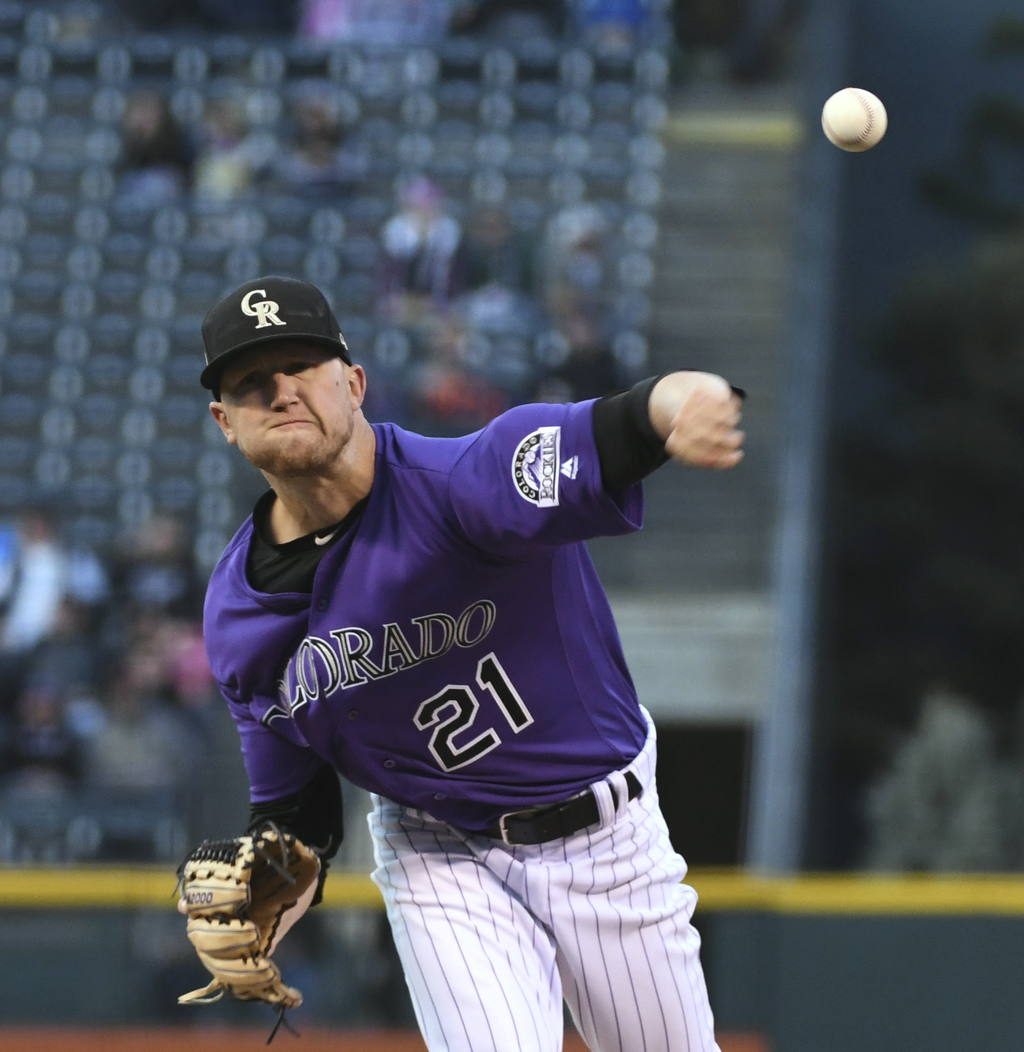 NL West-leading Rox win 8th straight to clinch playoff spot