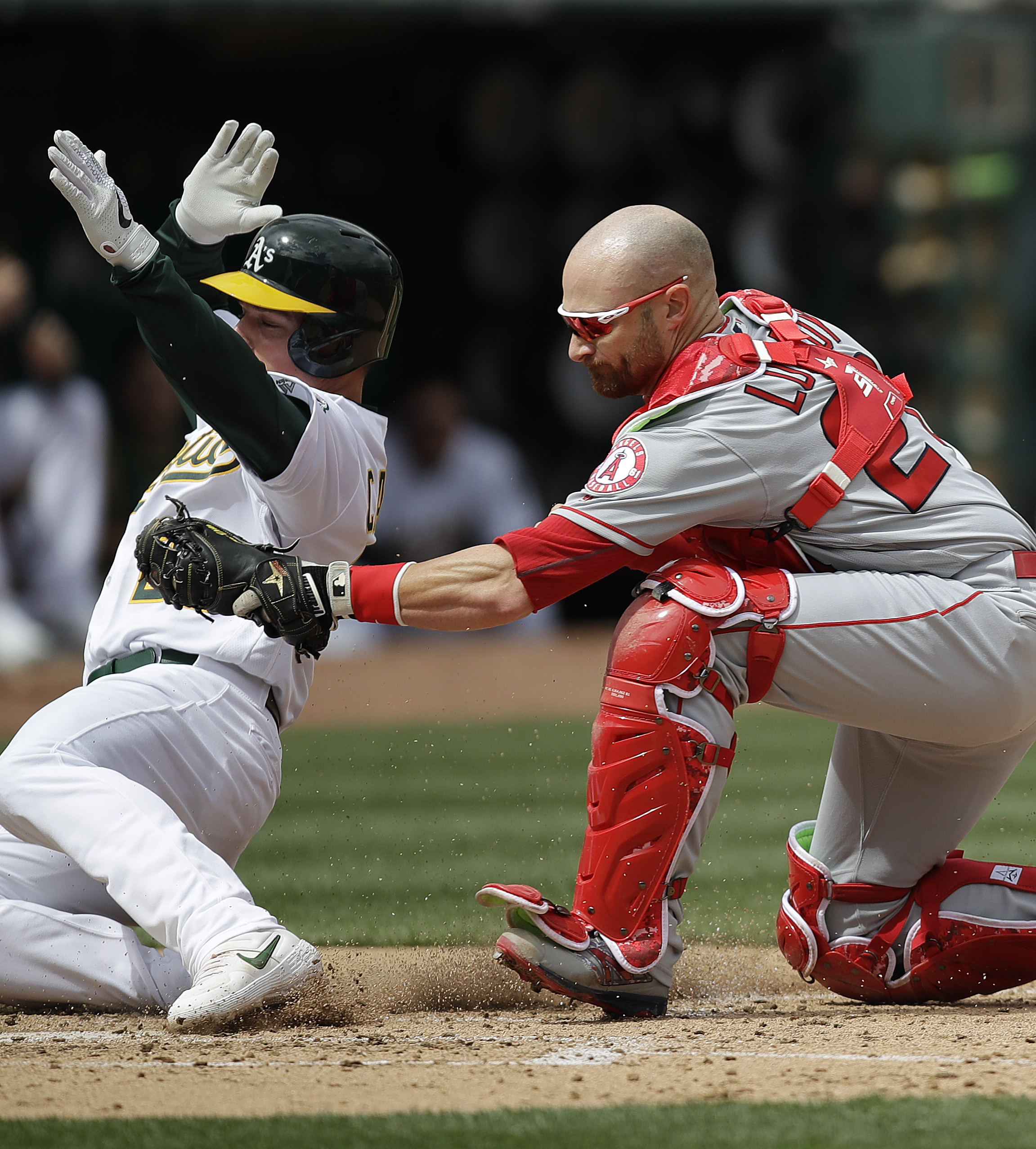 Davis hits second home run of season, A’s beat Angels 4-0