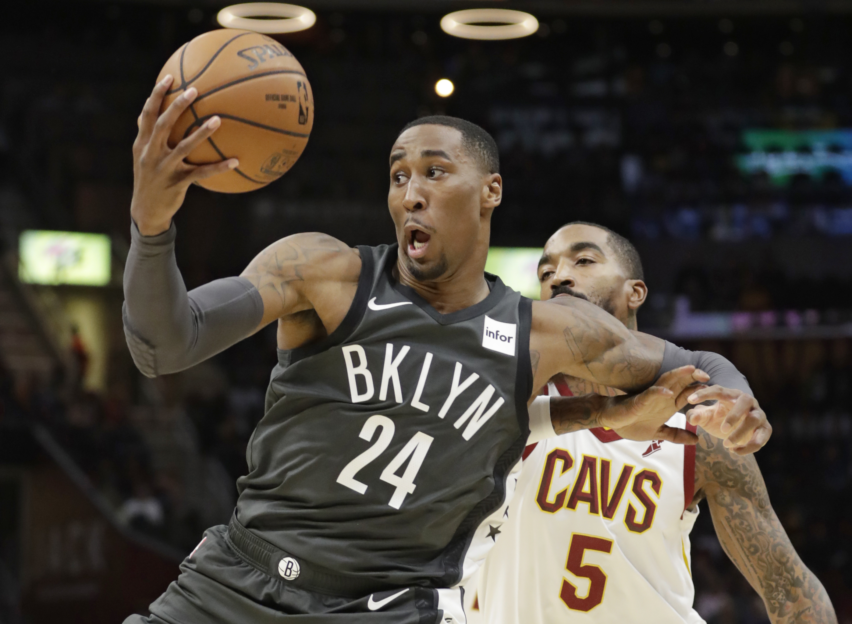 Russell, Harris lead Nets past winless Cavaliers 102-86