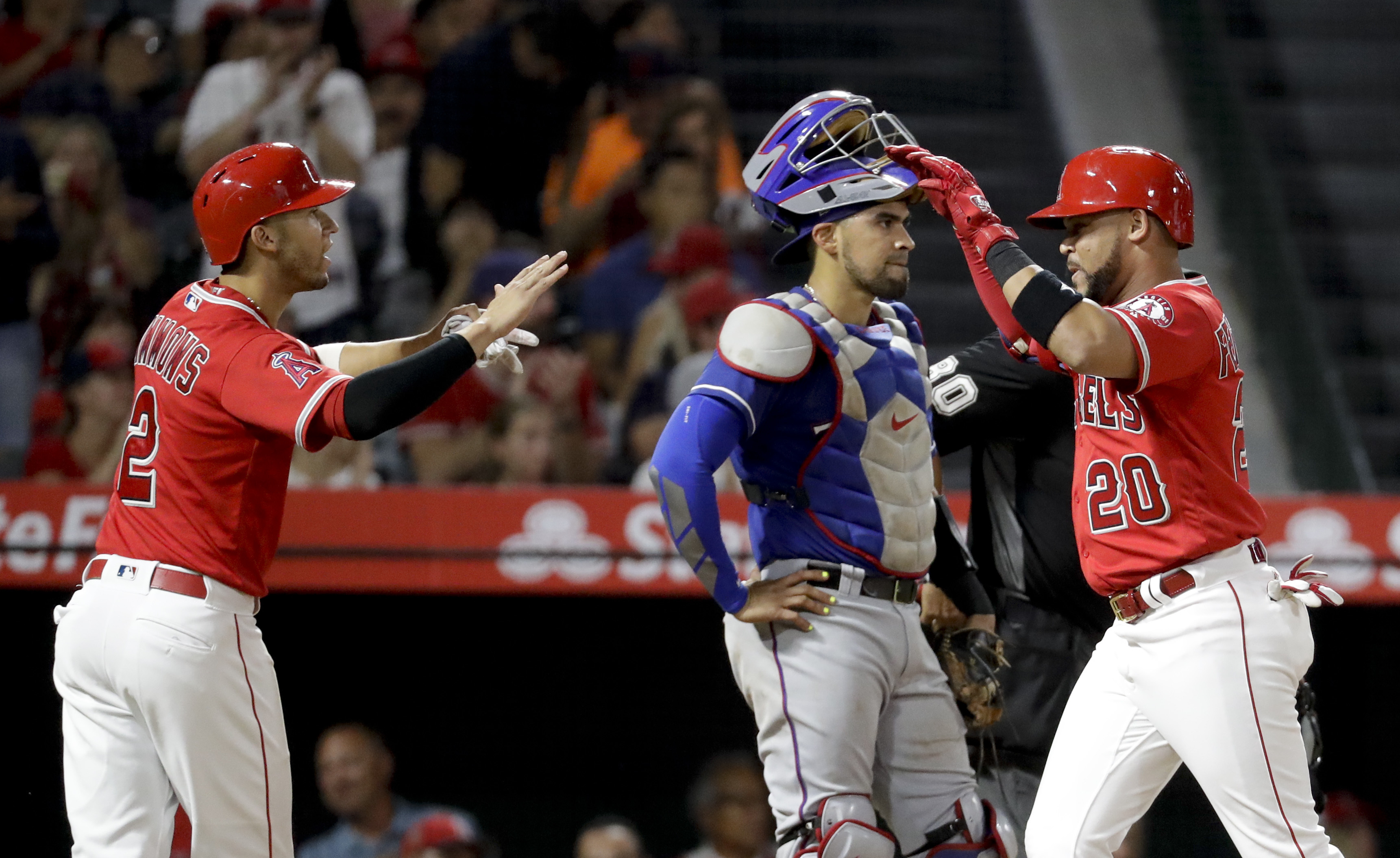 Rookies Arcia, Fernandez power Angels to win over Texas