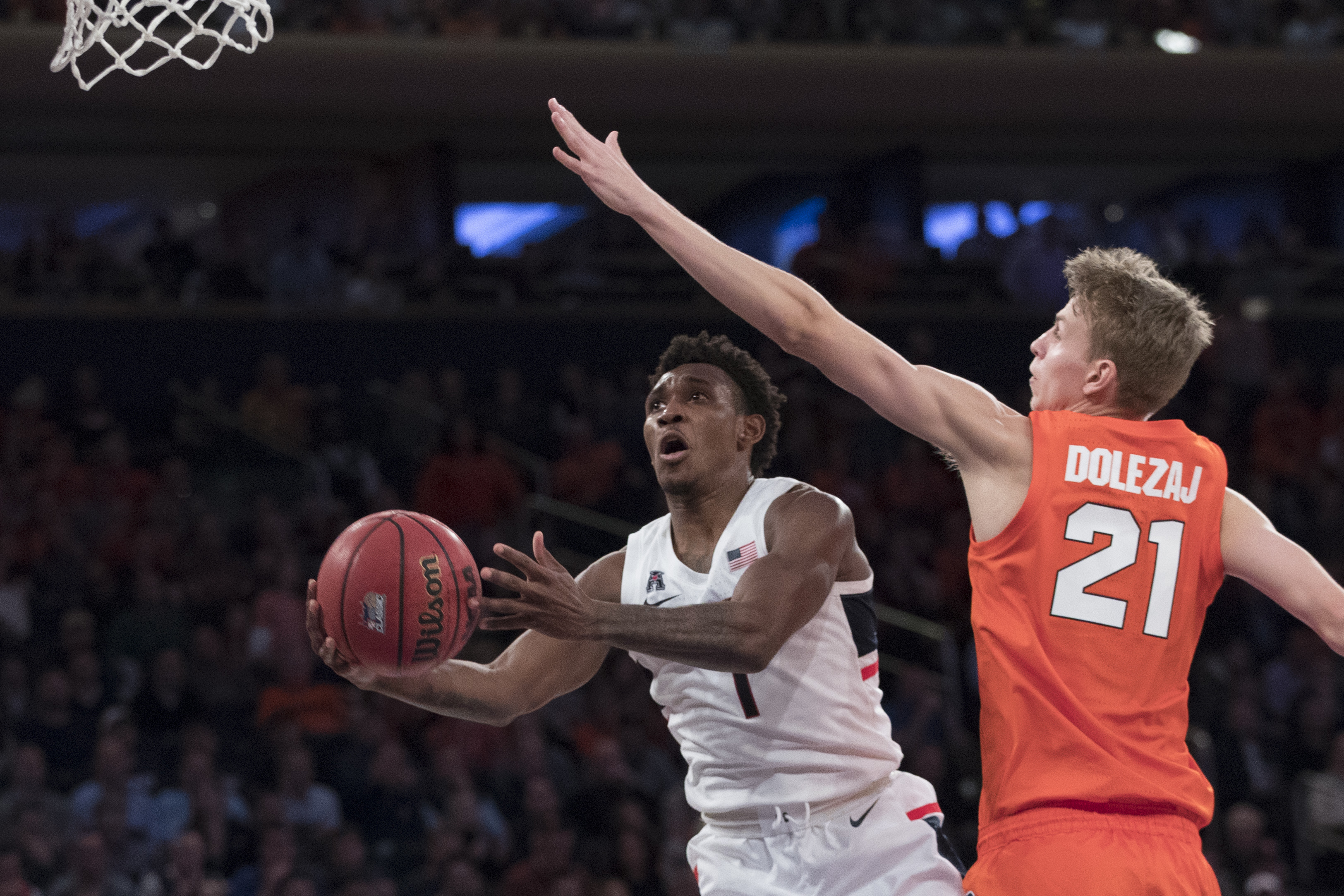 Connecticut upsets No. 15 Syracuse behind Adams and Gilbert