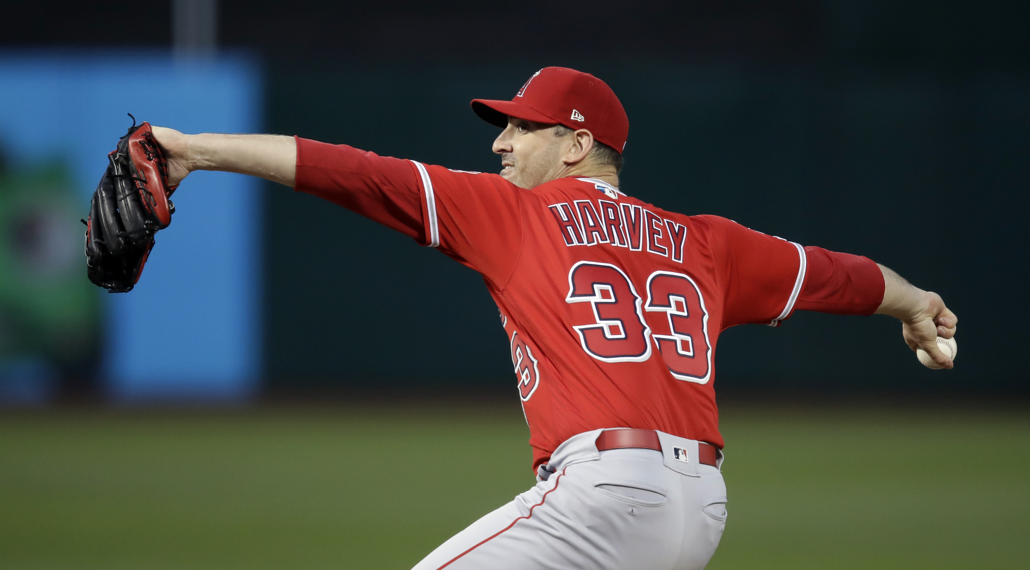 Harvey solid in debut, Angels rally to beat A’s 6-2