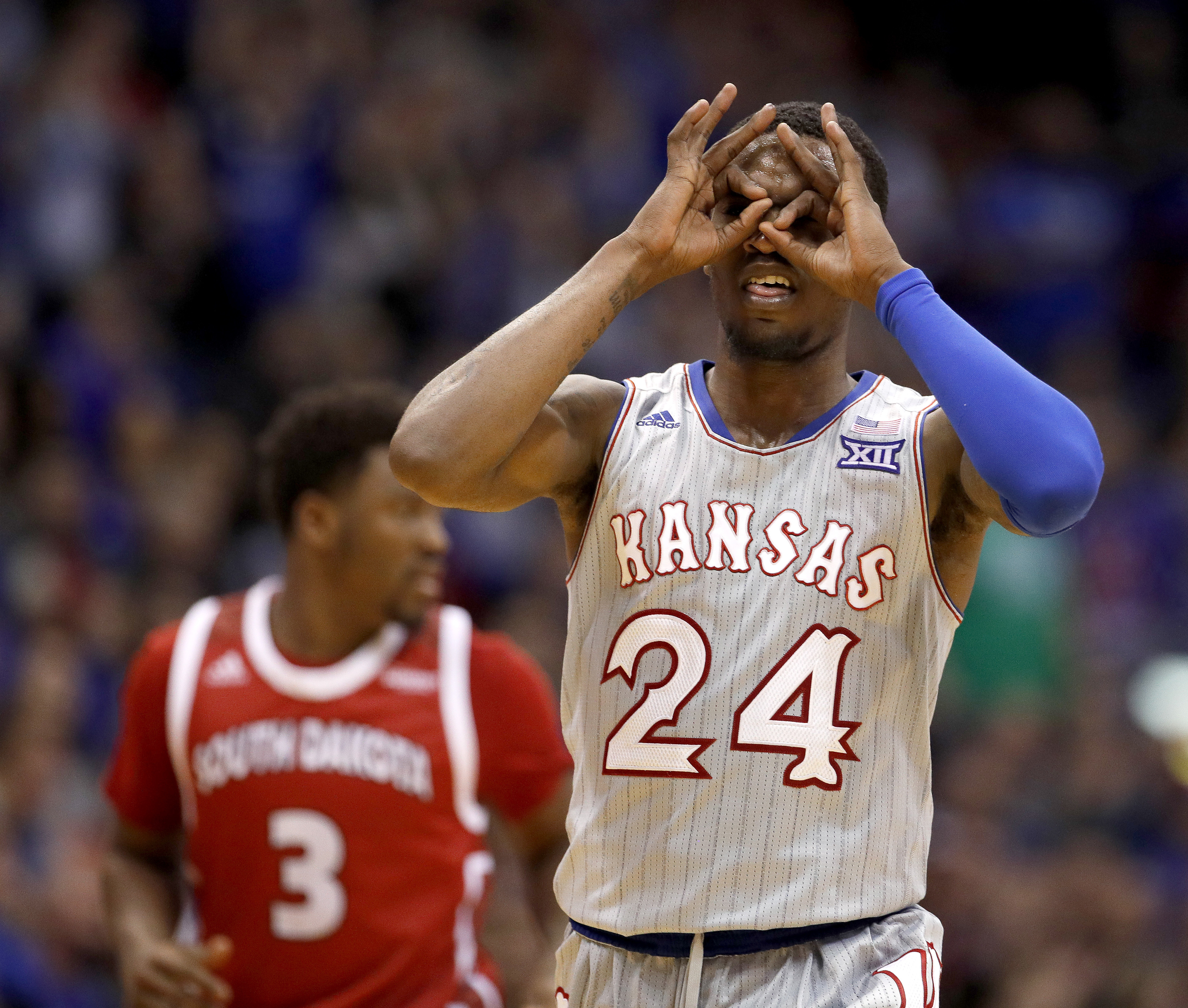 Lawson, Moore and No. 1 Kansas top overmatched South Dakota