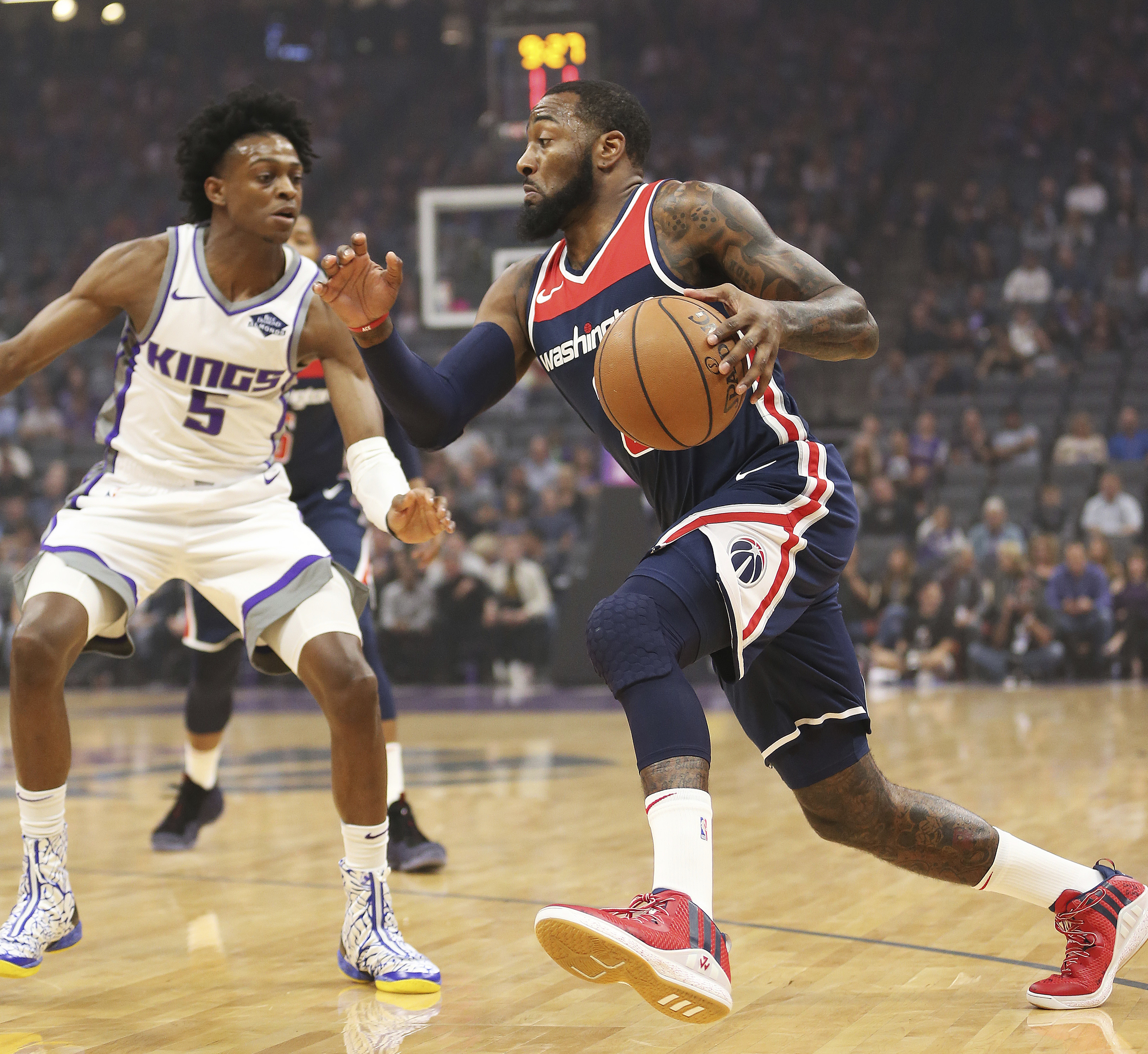 Kings take control in 4th, hold off Wizards 116-112