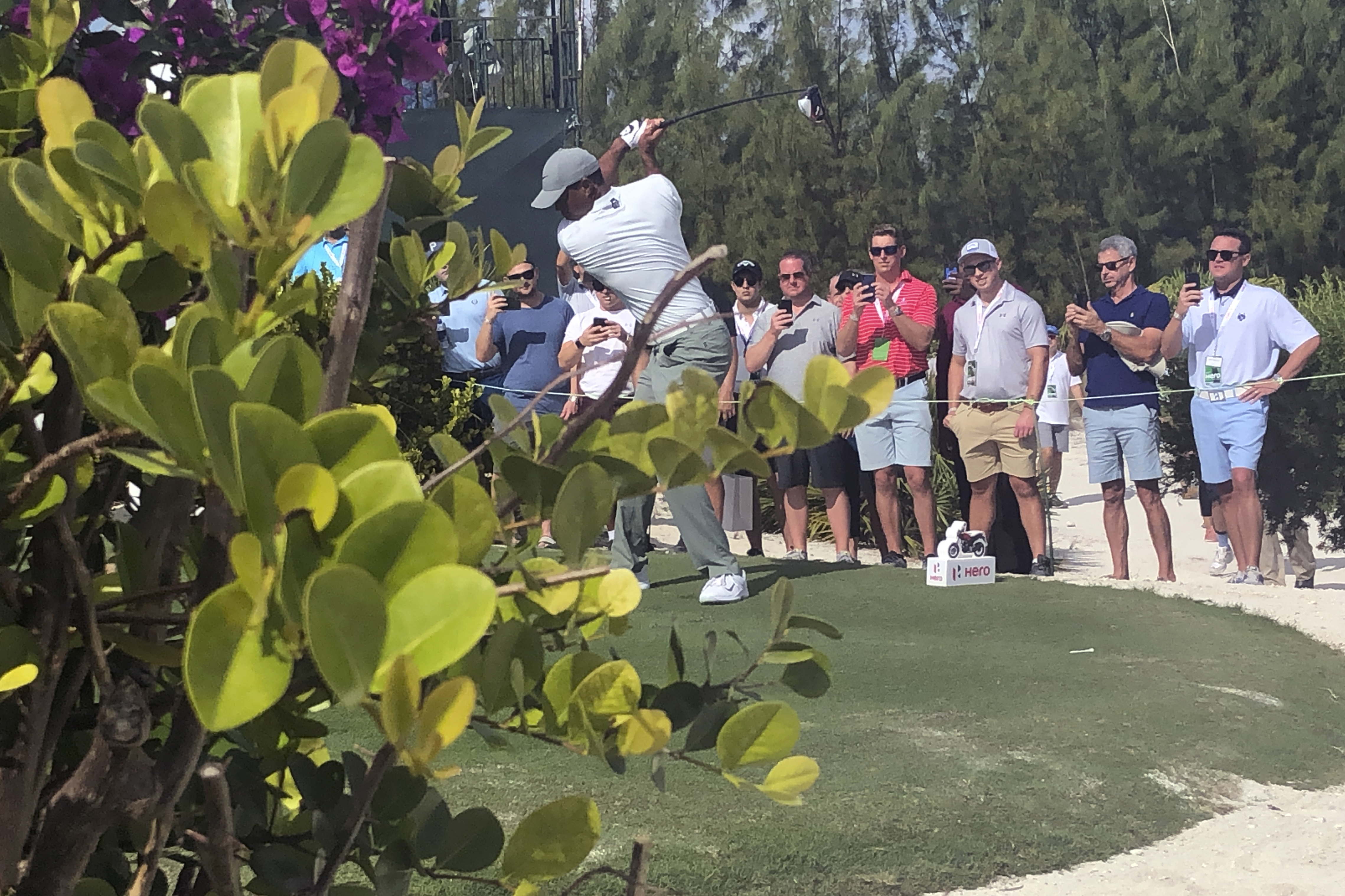 Woodland leads in the Bahamas as Tiger gets within 2 shots