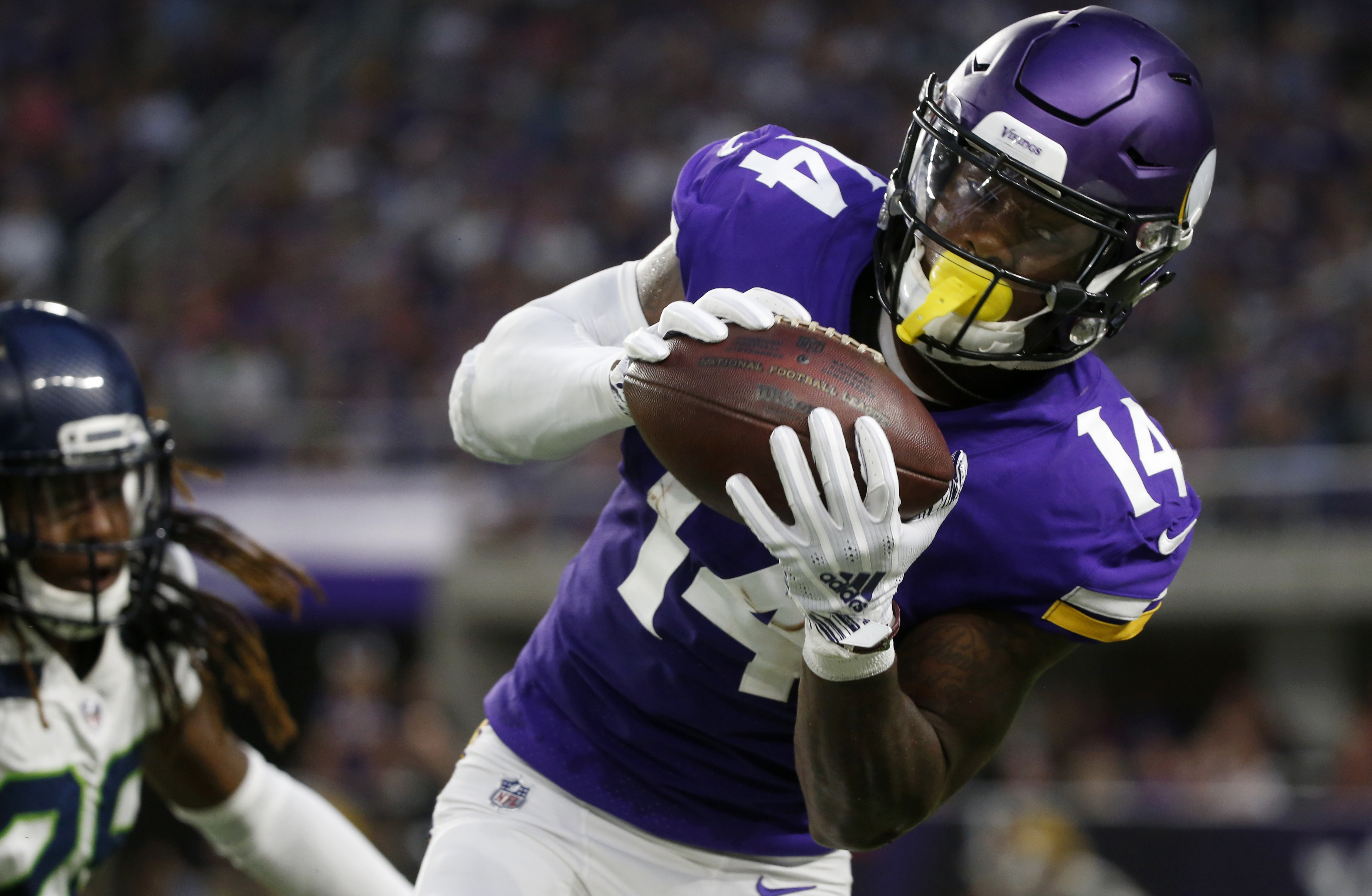 With Cousins early, Sloter late, Vikings top Seahawks 21-20