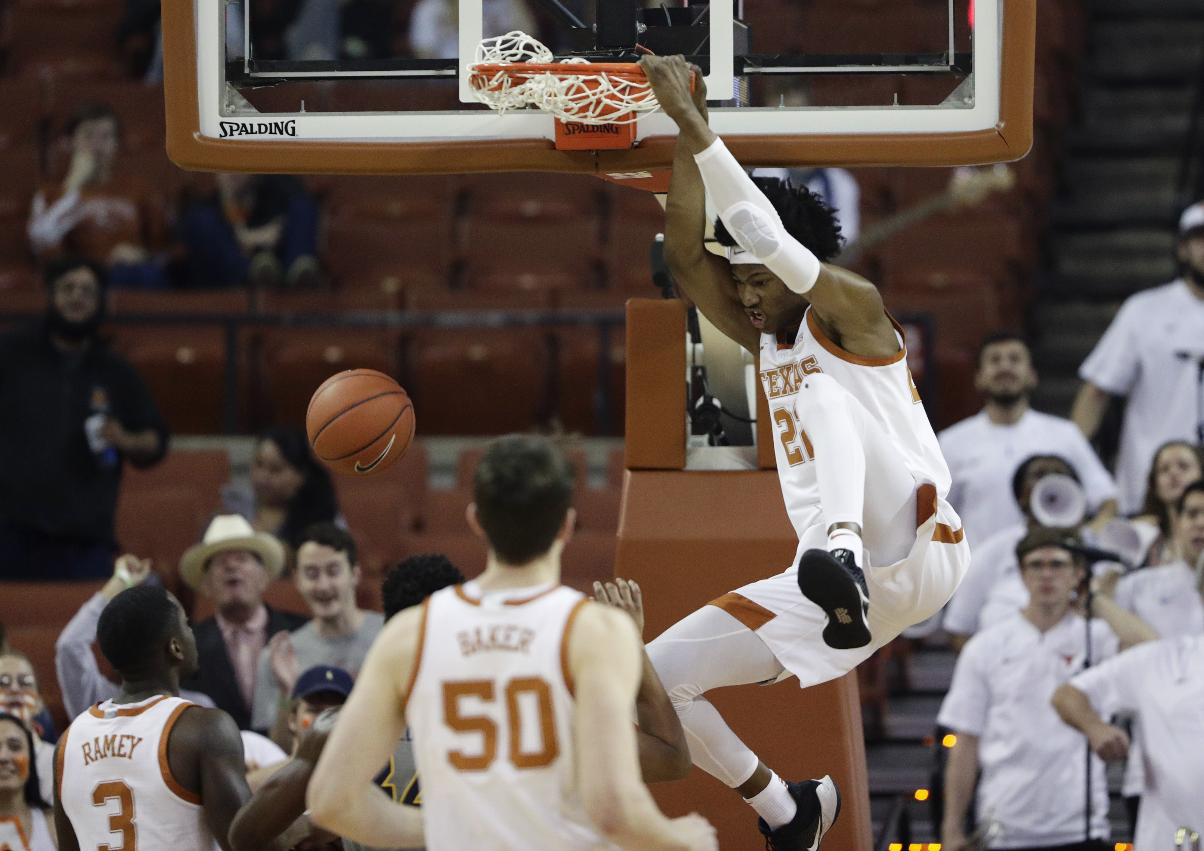 Jones, Ramey lead Texas past No. 20 West Virginia 67-57