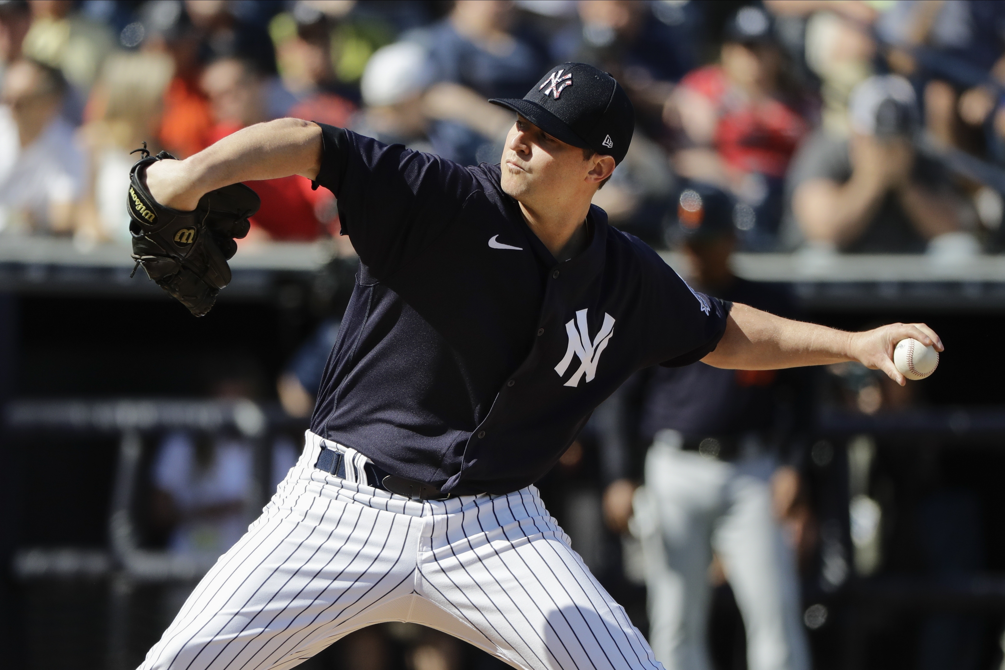 Yanks' Britton hit by line drive, has bruised right wrist