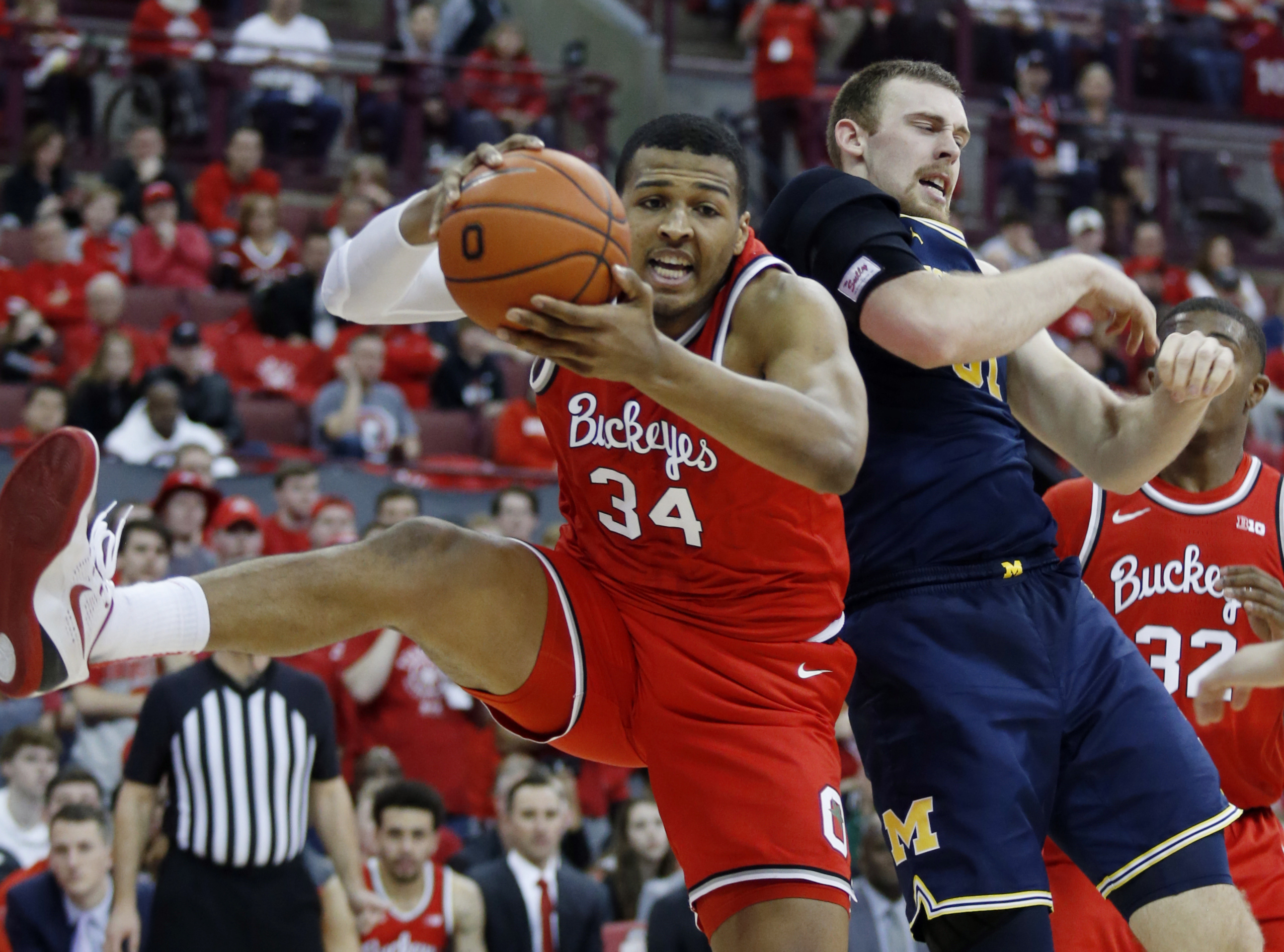 No. 23 Buckeyes surge late to beat No. 19 Michigan 77-63