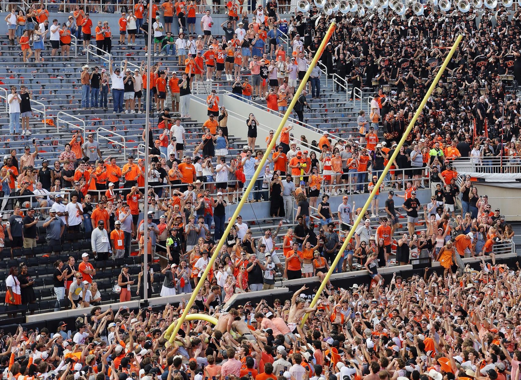 
					Oklahoma State Fans Tear Down Goal Post, Sing Oregon's 'Shout' After Upset Win
				